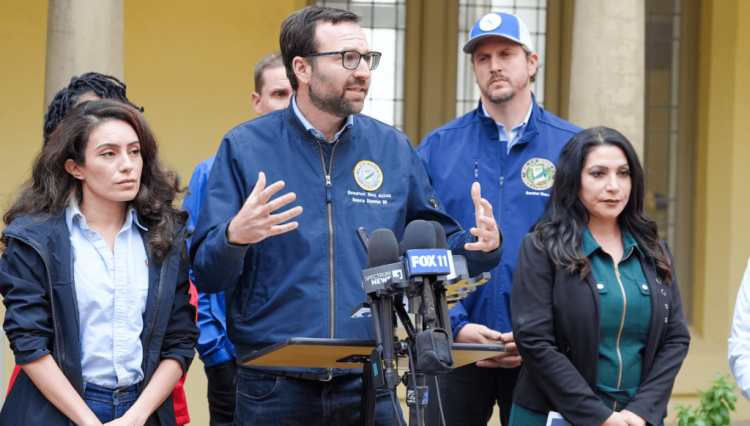 Senator Allen addresses the media during the unveiling of the Golden State Commitment bill package.