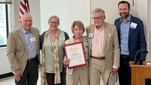 Senator Allen poses with Libby Motika and Steve Loeper after presenting a certificate of recognition